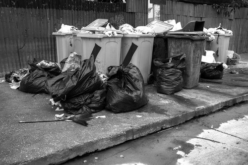 Workers managing construction debris